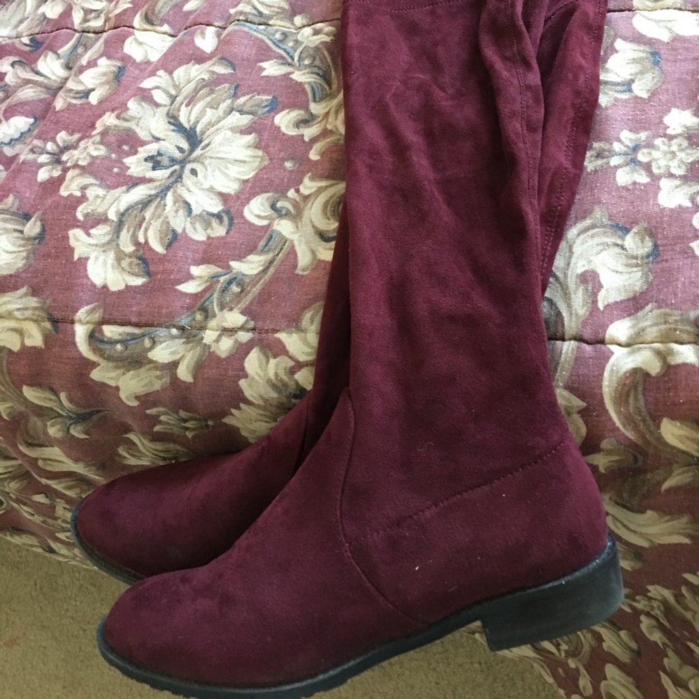 Thigh high boots. Better fir for someone thick